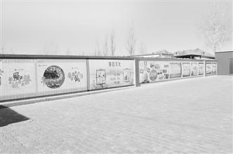乌加河镇文化墙绘出文明新风尚